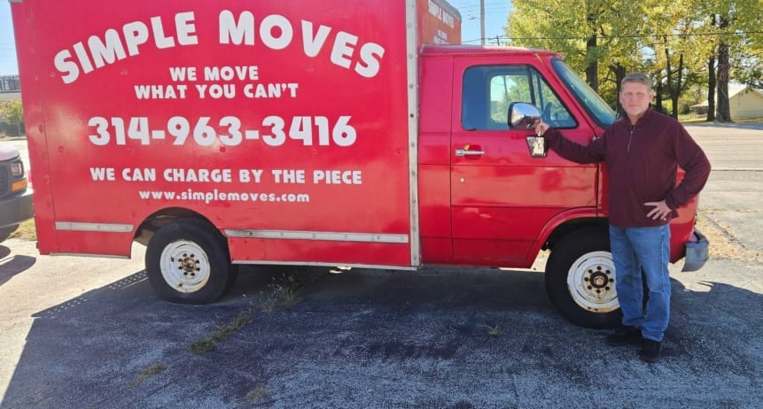 Red Simple Moves moving truck with company info and contact number.