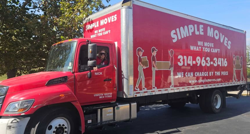 Moving truck for Simple Moves with company logo and contact info.